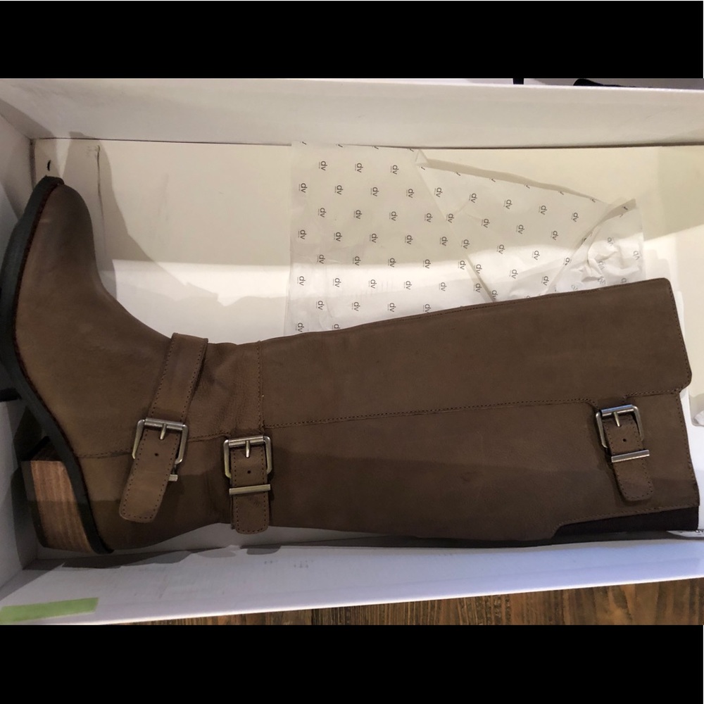 Brown knee leather boots by dolce vita.